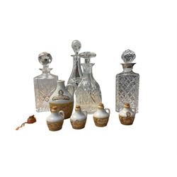 Four glass decanters, together with an empty Bronte Yorkshire Liqueur flagon and four miniatures 
