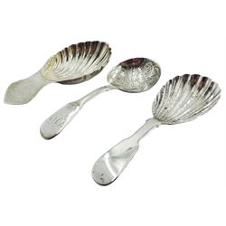 Three silver caddy spoons, the first Victorian Fiddle pattern example with shell shaped bowl, hallmarked Reid & Sons, Newcastle 1855, the second Victorian Fiddle pattern example with scroll engraved detail to the circular bowl, hallmarked Charles Boyton, London 1841, and the third later example with shaped handle and shell shaped bowl, hallmarked Turner & Simpson Ltd, Birmingham 1979, approximate total weight 1.28 ozt (40 grams)