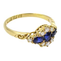 Victorian 18ct gold sapphire and diamond cluster ring, with engraved scroll design shoulders, Birmingham 1896