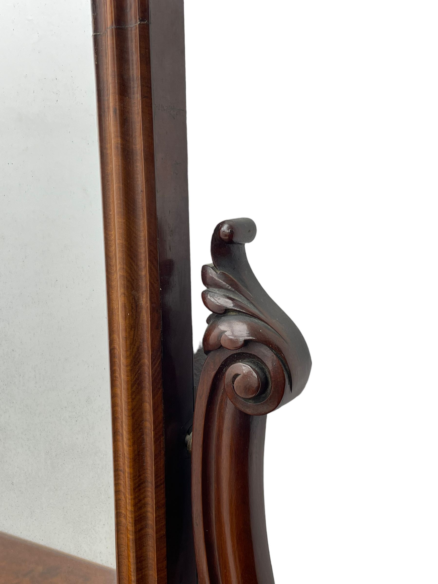 Victorian figured mahogany two-piece bedroom set - the washstand with white and black marble moulded top with arched back and raised shelf, two moulded frieze drawers, on turned and fluted supports with brass and ceramic castors (W123cm, D60cm, H102cm); the dressing table with raised swing mirror in moulded frame with shell and scroll carved pediment, on scrolled horns carved with foliage, four raised trinket drawers over moulded rectangular top, fitted with two drawers, on turned and fluted supports with brass and ceramic castors (W122cm, H177cm, D62cm)