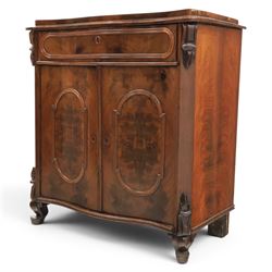 Victorian mahogany chiffonier, with serpentine front and book-matched veneered top, over a frieze drawer and cabinet, raised on pad feet