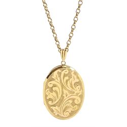 Gold engraved foliate locket pendant, on gold cable link chain necklace, both hallmarked 9ct
