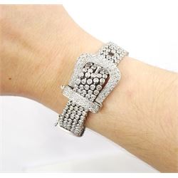 14ct white round brilliant cut diamond belt bracelet, the bracelet with rubover set diamonds, the buckle and clasp with pave set diamonds, stamped 14K, total diamond weight 5.35 carat