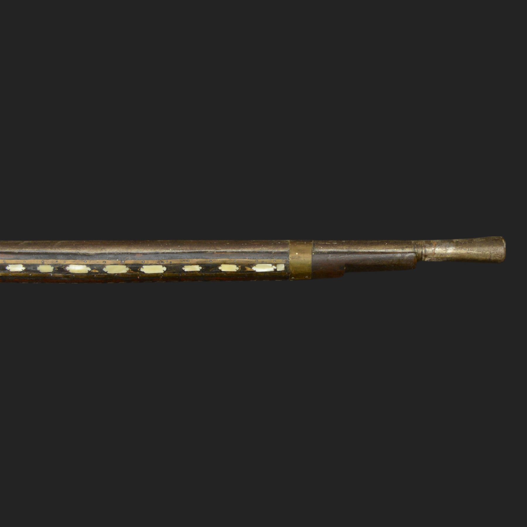 Indian Jezail style flintlock musket, with 118cm barrel, the East India Company lock marked 1818,  the curved butt inlaid with mother of pearl and brass decoration, overall L155cm