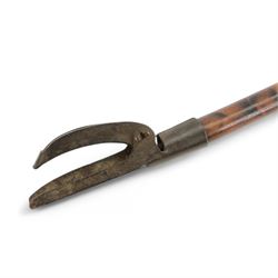 19th century library longarm or book picker, the cane with simulated finish, the brass top stamped A C Harris Leicester, L93cm


