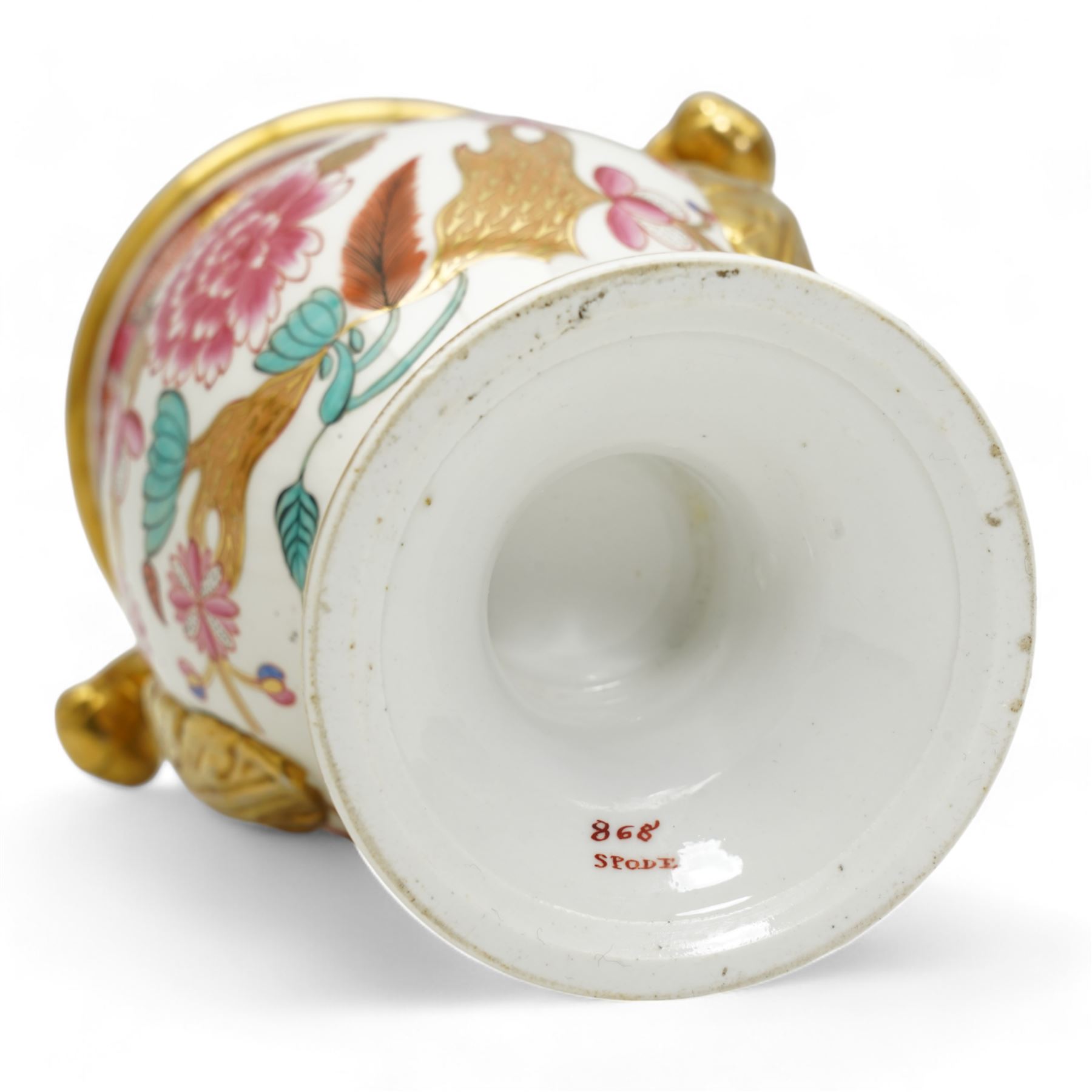 Early 19th century Spode vase and garniture, each decorated in the Japan pattern no. 868, with twin scroll handles and pedestal foot, H15.5cm max; together with Spode pen tray, pattern no. 093, L27cm; pastille burner, H8cm; and an 18th/19th century porcelain vase and cover, decorated with panels of flowers within orange and gilt bands, possibly Spode H16cm (6)