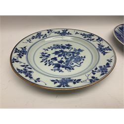 Japanese Meiji period Arita blue and white plate, of circular form, painted with riverside landscape and bird upon flowering branch, with character mark beneath, D24.5cm, together with two 18th century Chinese blue and white plates, each painted with floral design, each approximately D22.5cm