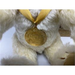Modern Steiff teddy bear - The Millenium Bear No.34709 with golden pendant H32cm; in original box with paperwork; together with a Steiff ball-point pen in case sent to the vendor as compensation for a delay in receiving the bear.
