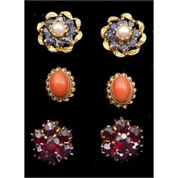 Pair of gold sapphire and pearl cluster stud earrings, pair of garnet cluster stud earrings and a pair of coral earrings, all 9ct hallmarked or tested