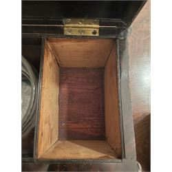 Early 19th century rosewood and brass inlaid tea caddy, of sarcophagus form, the front and hinged opening cover inlaid with brass scrolling panels, opening to reveal a compartmented interior with twin removable boxes with conforming inlaid brass detail to the hinged covers and zinc lining to the interiors, flanking a later glass mixing bowl, the whole upon four turned cylindrical feet, H21cm W36cm D20cm