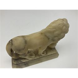 Pair of alabaster lions, after the medici lions upon rectangular bases, H13cm