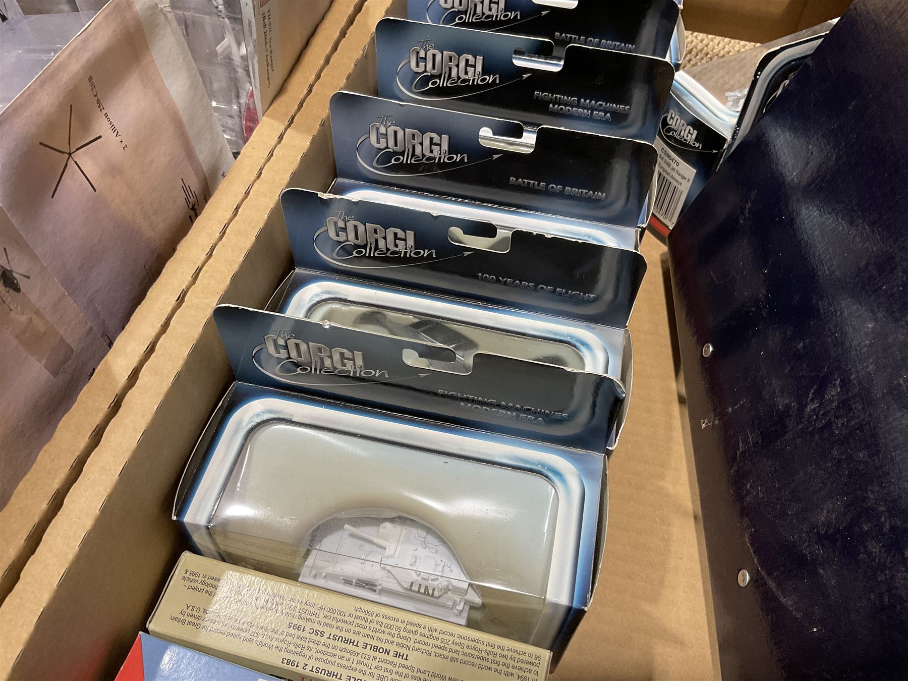 Thirty-six Amer Czechoslovakia periodical issued metal models of helicopters in original packaging; with thirty-nine issues of 'Helicopter Magazine' in two original binders; together with eight Corgi Collection die-cast military models; all boxed; and two others with small display rack; in three boxes