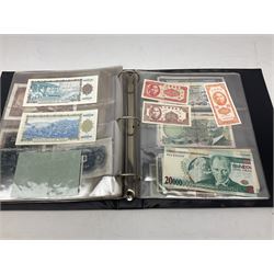 World banknotes, including Queen Elizabeth II The States of Jersey one pound 'DB202703', five pounds 'BB527762' and ten pounds 'AB651481', reserve bank of New Zealand two dollars '1L3 741894', King George V Straits Settlements one dollar 1st January 1935 'F/83 28924', various Bank of England notes etc, housed in two ring binder albums