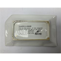 Fornasetti rectangular 'Toscanni's Concert' poster ashtray decorated with black and white text with a gilt border edge, with printed mark beneath, H22cm 