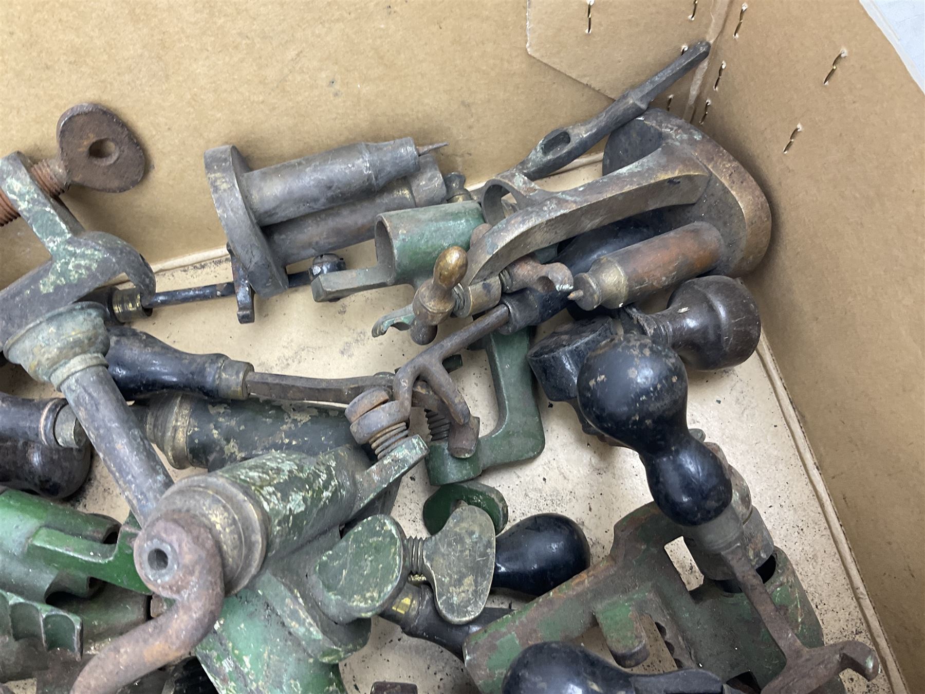 Over twenty items of shotgun cartridge making equipment including eight roll turnover tools, four re/decapping tools, six powder measures etc