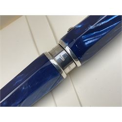 Montegrappa Emblema ball pen, the blue pearl marbled barrel of octagonal form with silver mounts and terminal with 1912 emblem, stamped 925 and clip with roller, in box, L13.5cm