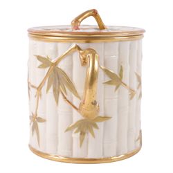 Royal Worcester Blush Ivory twin handled biscuit barrel and lid, in the form of bamboo with gilt highlights, H19cm 