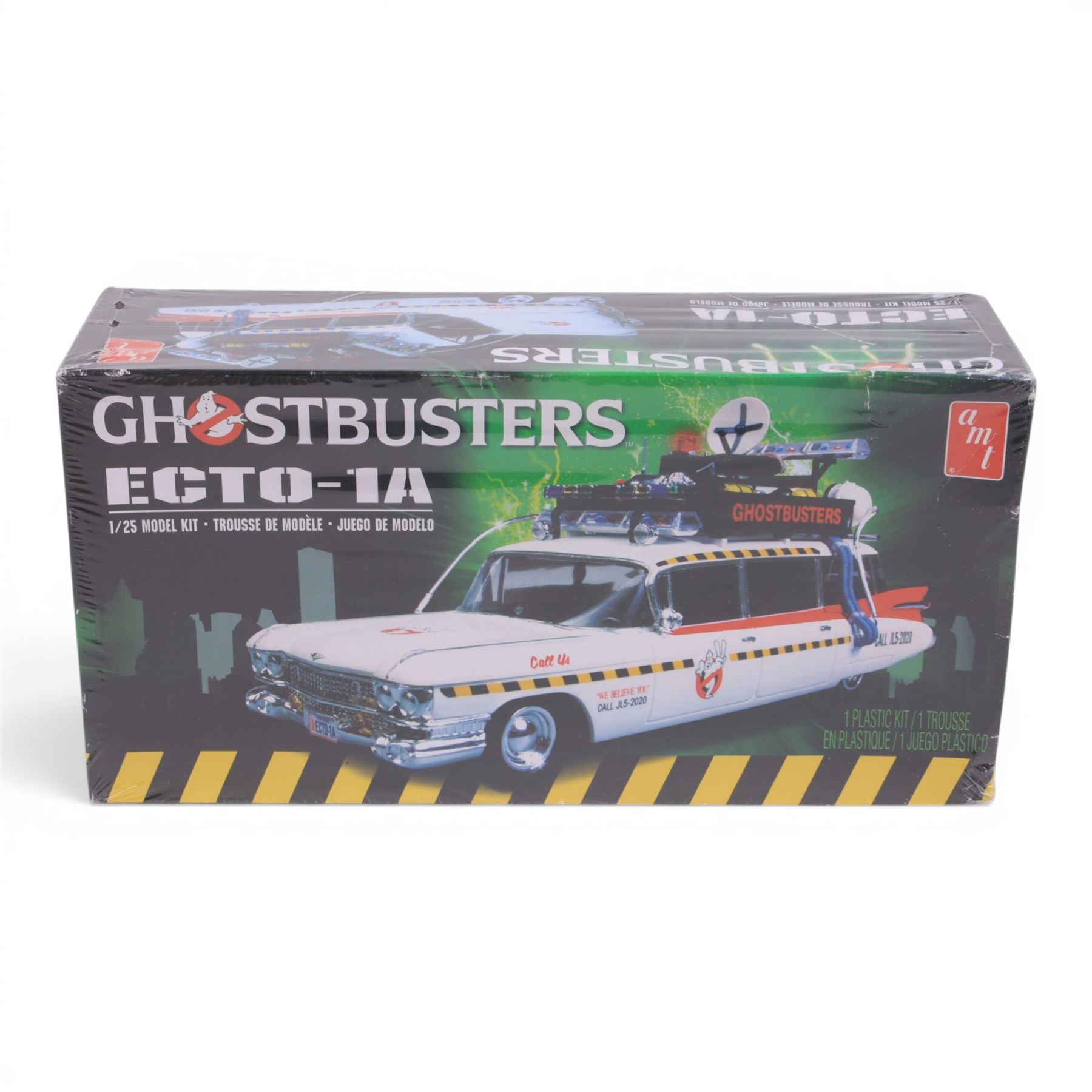 Neca Back to the Future Marty Mcfly figure, AMT Ghostbusters Ecto-1A 1:25 scale model kit and Vinyl Idolz Egon Spengler figure, all boxed