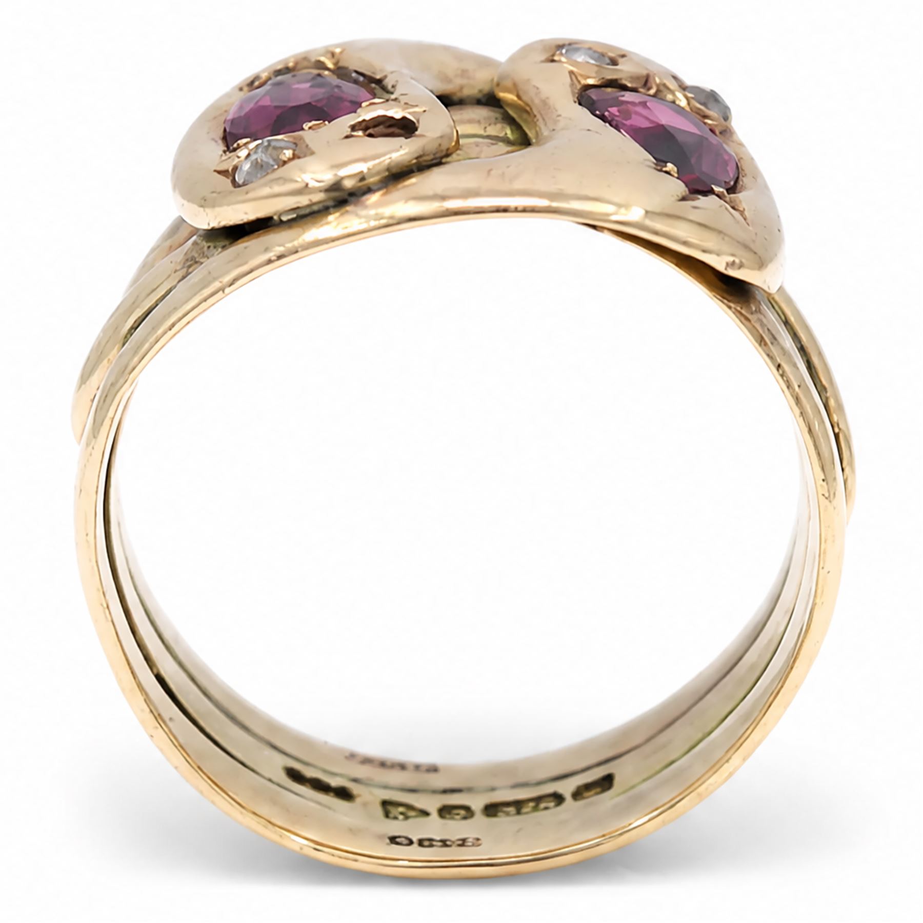 Edwardian 9ct rose gold garnet and diamond double coiled snake ring, set with rose cut diamonds and pear cut garnet, Chester 1907