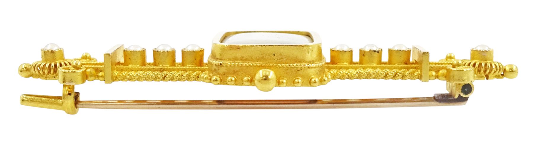 Victorian gold Etruscan revival portrait brooch, the bead and wirework brooch set with a central portrait of a woman in 18th century dress and eight seed pearls on ivory, in a velvet and silk lined box by A.K. Watters of Edinburgh. This lot has been registered for sale under Section 10 of the APHA Ivory Act