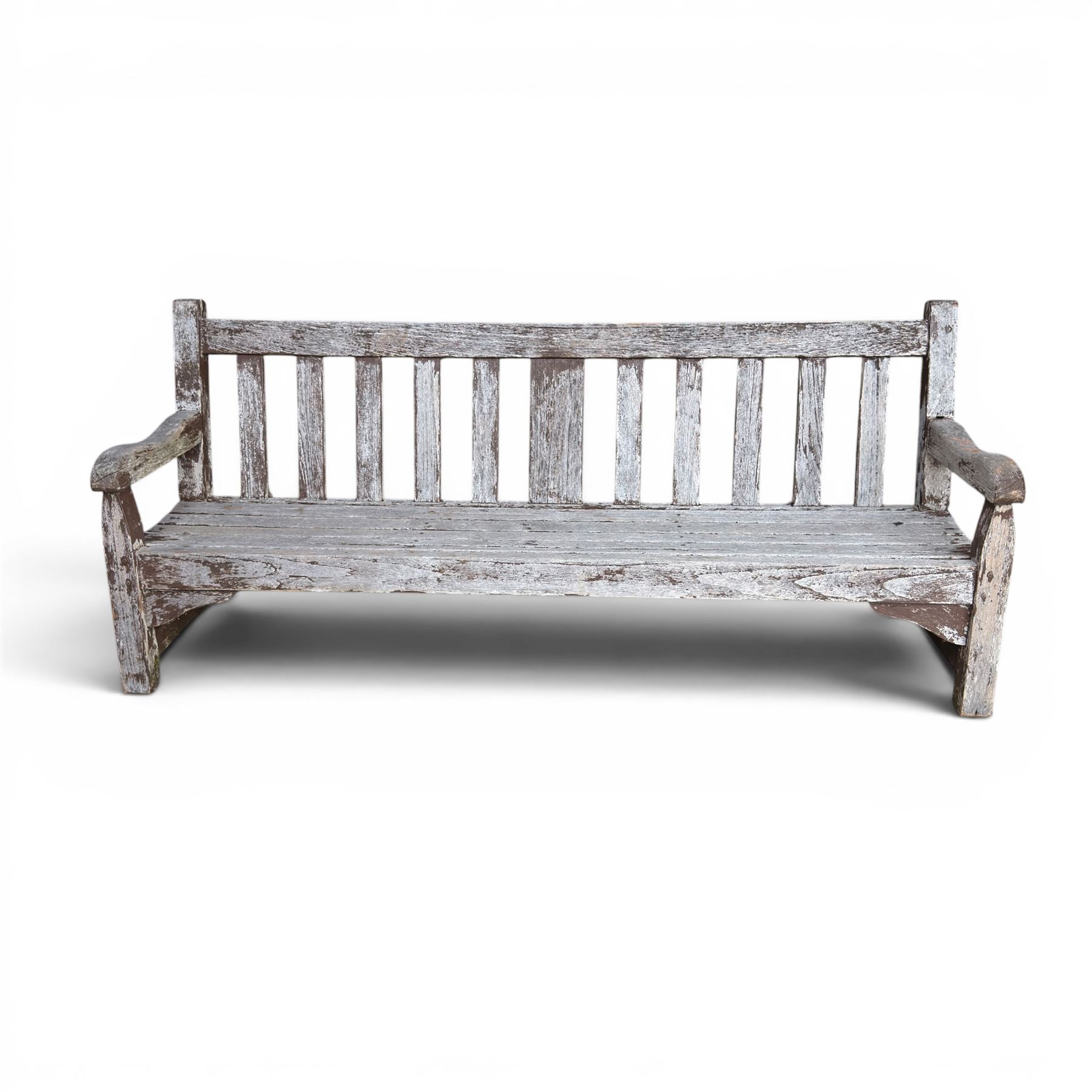 Teak garden bench with slatted back and seat on square supports in weathered which finish 