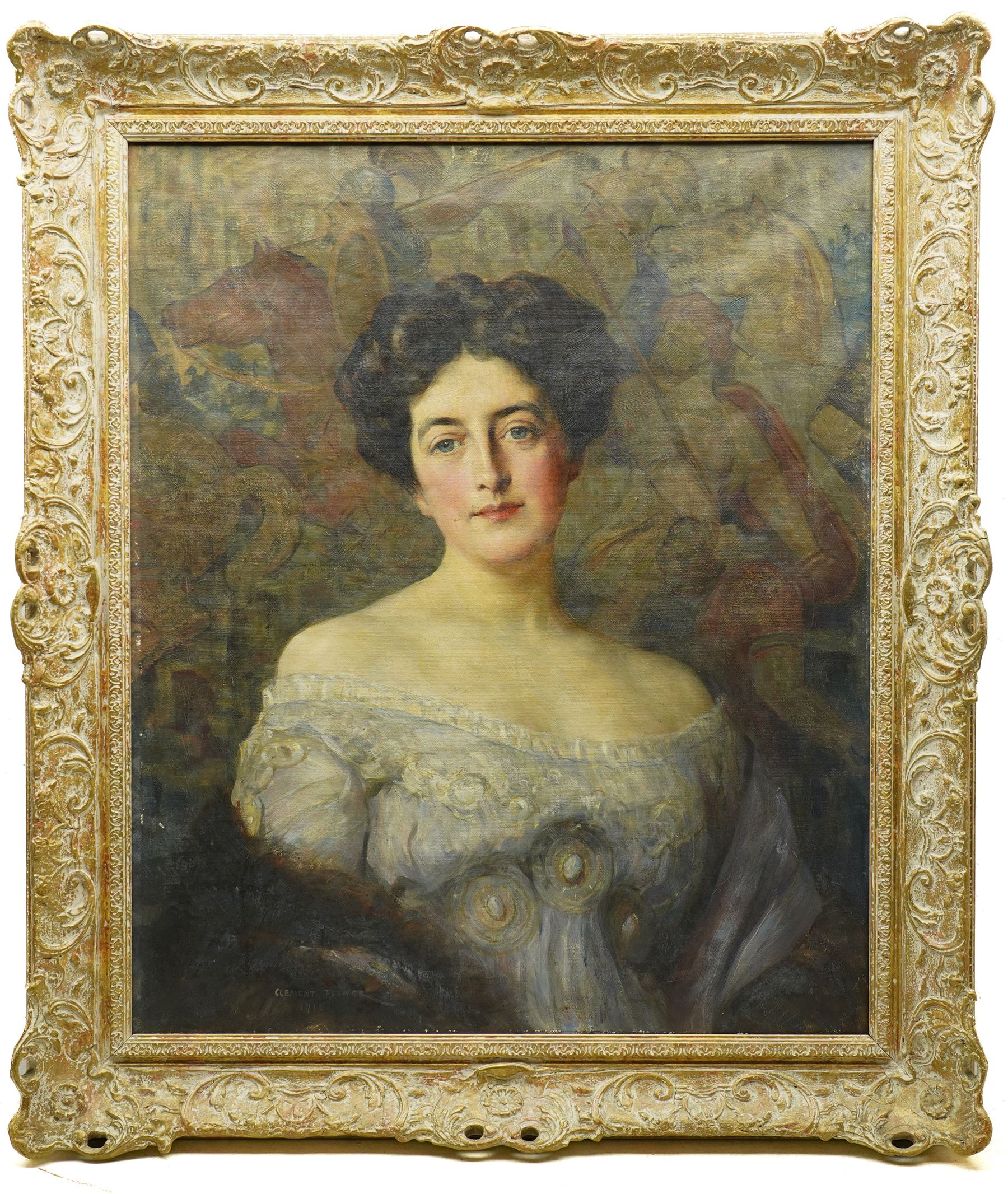 Clement B Flower (British Late 19th to Early 20th century): Portrait of an Edwardian Lady 'Miss Diane Jackson' with a Medieval Tapestry Behind, oil on canvas signed and dated 1910, labelled verso 75cm x 62cm
Notes: Clement Flower was a student at Hubert von Herkomer's art school in Bushey, Hertfordshire