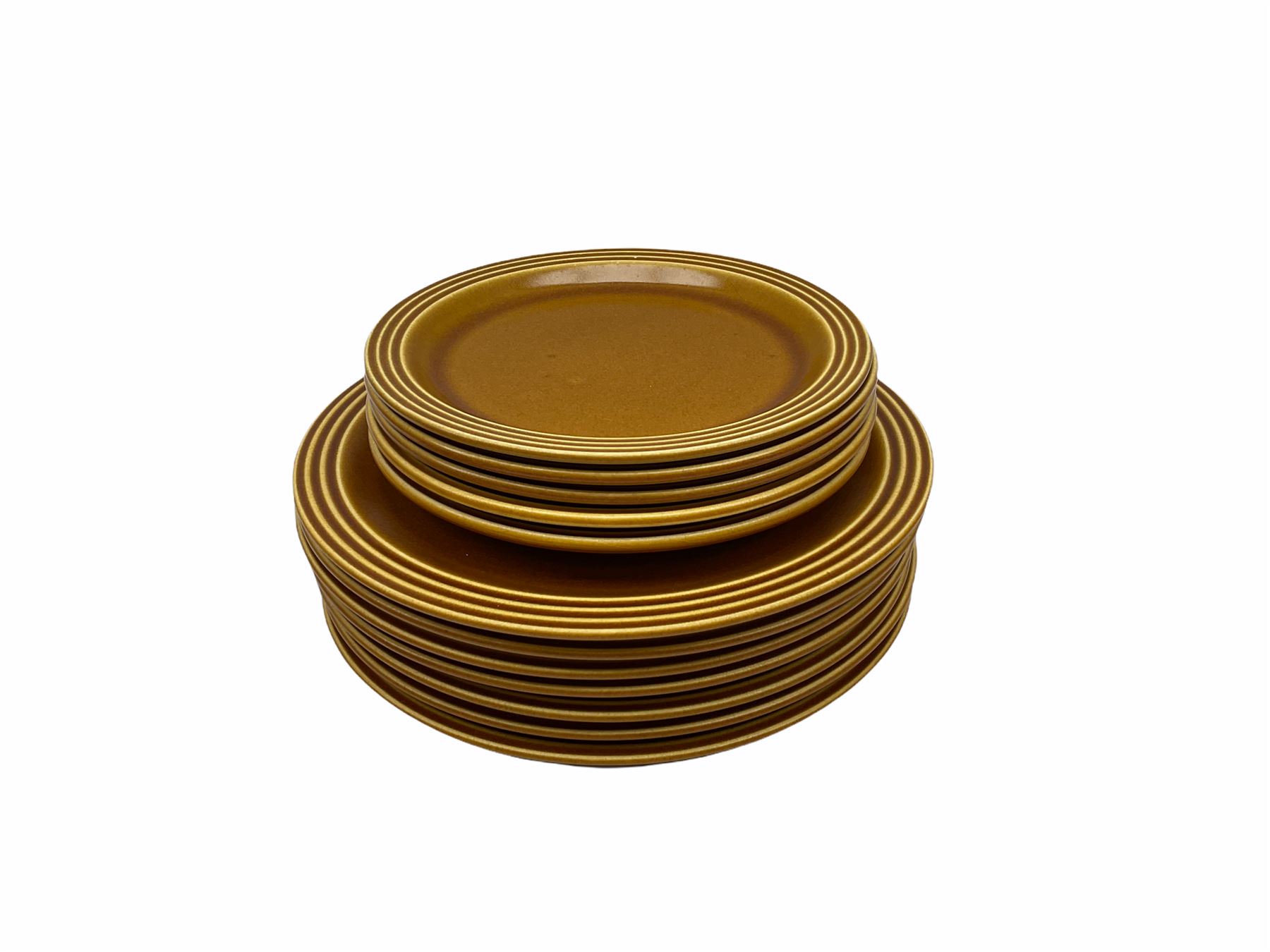 Hornsea Pottery Saffron pattern dinner and tea ware, comprising two lidded vegetable dishes, oval platter, nine dinner plates, six side plates, seven tea plates, covered tea caddy, covered coffee caddy, coffee pot, large jug, small jug, eight cups and seven saucers (45).  