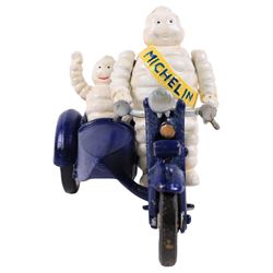Cast iron figure, modelled as a Michelin man upon a motorbike, H18cm