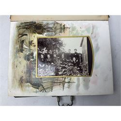 Victorian desk ink blotter, decorated with painted spray of flowers within stylised gilt rococo spandrels with mother of pearl fixings, together with a Victorian photo album containing interior leaves with apertures of various sizes and shapes of portraits surrounded by printed sea and dock scenes, blotter L28cm
