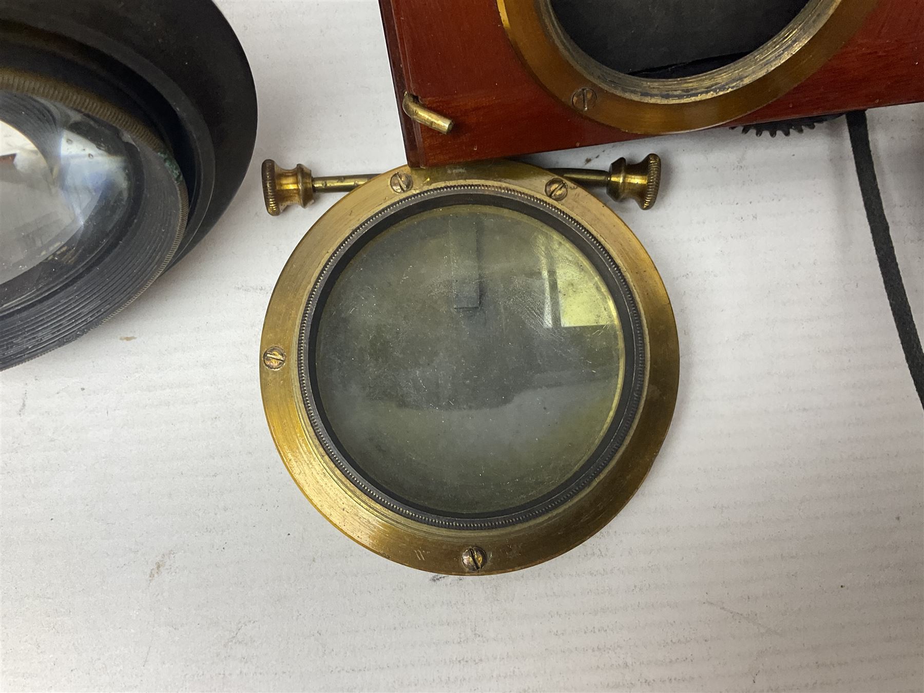 Selection of Brass Camera Lenses, to include Ross London lens 8 1/2 x 6 1/2, Beck Symmetrical lens, etc together with lens holders 