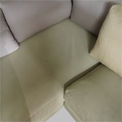 Christian Liaigre (1943-2020) - 'Arpege' handmade L-shaped sectional sofa, upholstered in neutral leather, with broad squared arms, deep seat cushions, angled chaise section, loose back cushions, raised on block feet