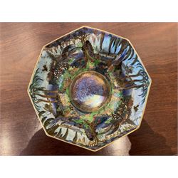 Early 20th century Wedgwood Fairland lustre bowl, circa 1920, of octagonal form, designed by Daisy Makeig-Jones, the exterior decorated in the Castle on the Road pattern, the interior decorated in the Fairy in a Cage pattern, pattern no Z5125, with printed marks beneath, H11cm D22.5cm

