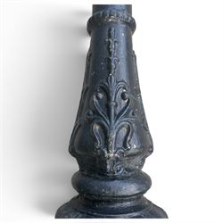 REVO Electric Co. Ltd., Tipton - early 20th century cast iron street lamp standard, the later hexagonal lantern with amber leaded glazing and pointed finial, supported on a swan-neck bracket above a ring-turned capital, tapering column and ladder rest, terminating in a moulded scrolling foliate-decorated base with lappet collar, stamped REVO

Provenance: formerly installed as street lighting in Prestwich, Greater Manchester