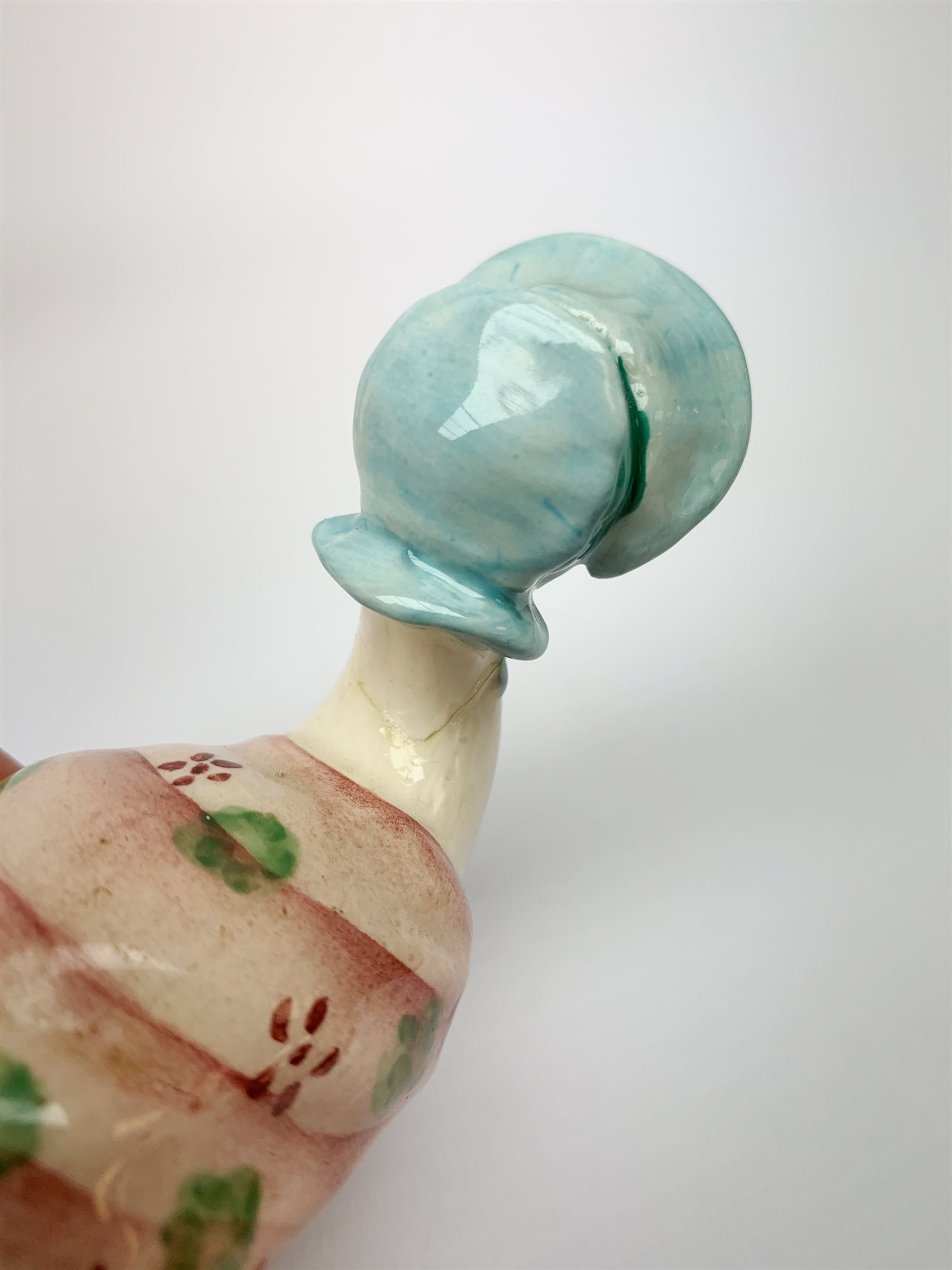 Five Beswick Beatrix Potter figurines, comprising Tommy Brock, Mrs Tiggy Winkle, Jemima Puddleduck, Foxy Whiskered Gentleman, and Squirrel Nutkin, together with four Royal Albert Beatrix Pottery figurines, Comprising Tommy Tiptoes, Benjamin Wakes Up, Peter Rabbit, and Mr Alderman Ptolemy. 