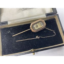 9ct rose gold mourning pin, decorated with an eye and a masonic symbol behind a glazed panel, toghether with a silver albert chain, with silver fob, silver cheroot holder, plated vesta case in the form of a book and a gentleman's Glycine wristwatch