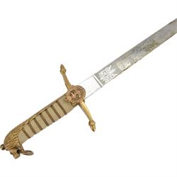 George V midshipman`s dirk, the 45cm straight single edged blade, length etched with crowned GRV cypher and anchor foliate scrolls, gilded brass hilt with lion`s head pommel and wirebound fishskin covered grip, in brass mounted leather sheath, the upper mount engraved  'C.R.B', with a cord and wire knife knot, overall L6cm` 