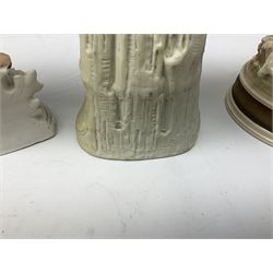 Late 19th century continental spill vase as a young girl standing beside an open tree trunk H21cm; and three German bisque figures (4)