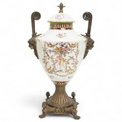 Wong Lee twin handled ceramic urn, with enamelled cherubs among animals and foliate decoration with bronzed metal mounts, upon a square base with paw feet, together with similar twin handled urn with enamelled floral decoration, marked to base, largest H48cm (2)