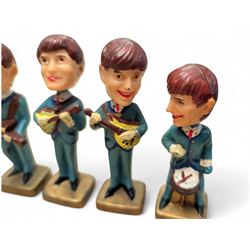 Set of four The Beatles plastic nodding / bobble head figures, H10cm