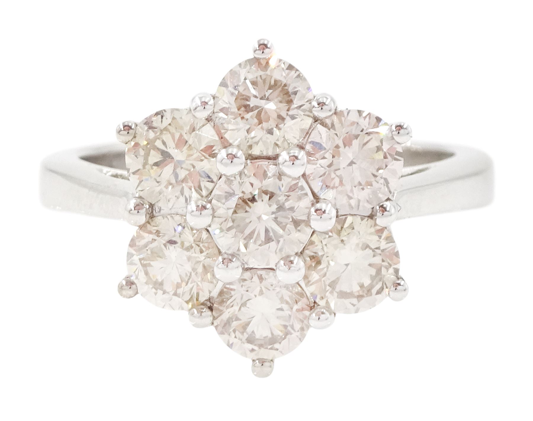 18ct white gold diamond daisy cluster ring, set with seven round brilliant cut diamonds, stamped 750, total diamond weight 2.16 carat, with World Gemological Institute report