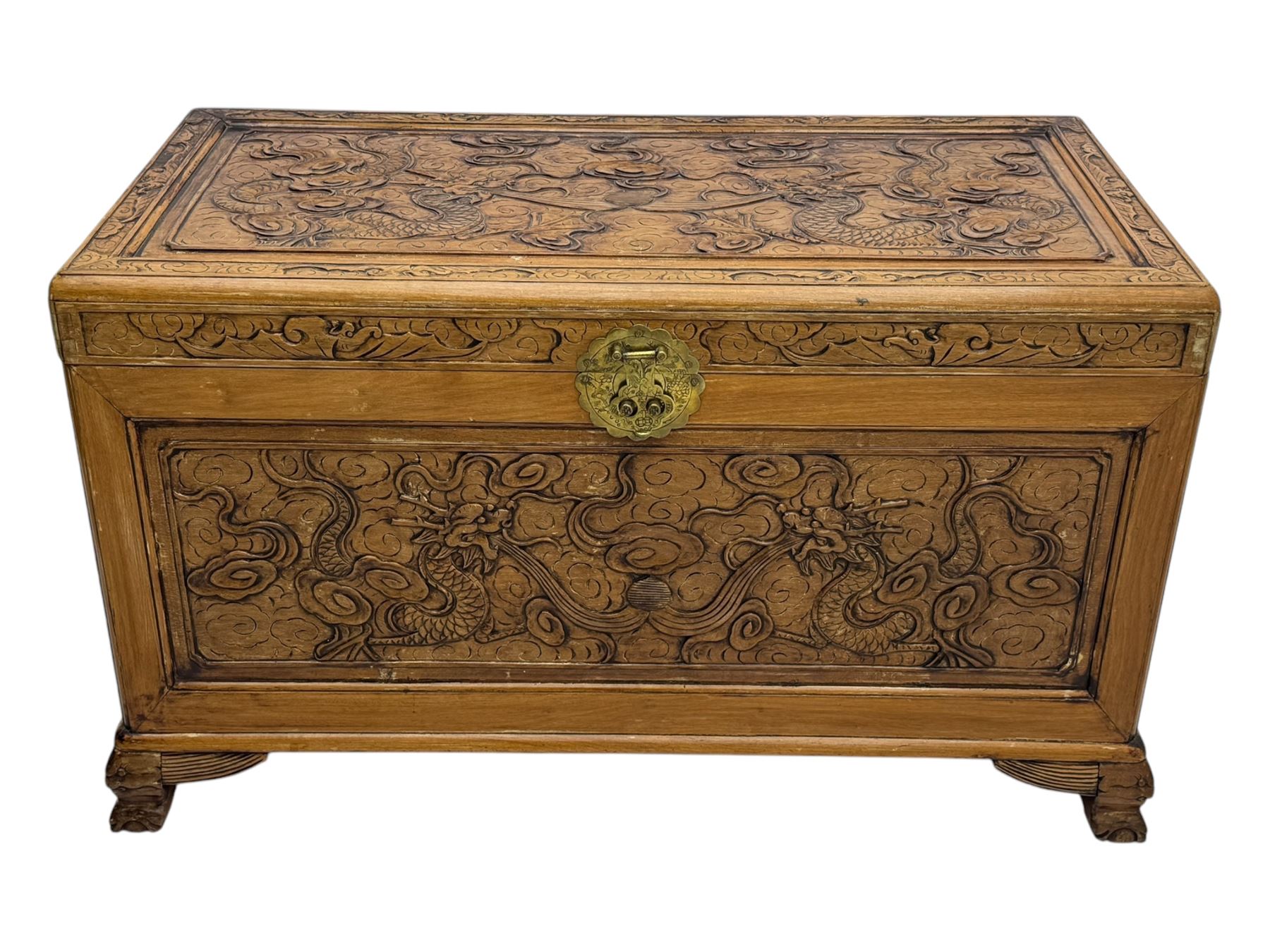 Chinese camphorwood blanket chest with stylized dragon carved decorated lid