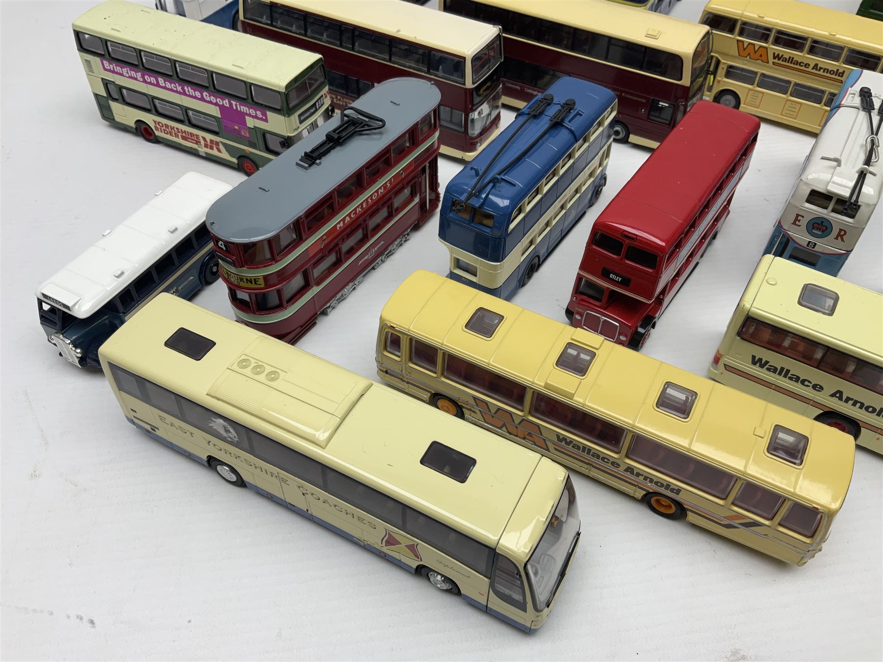Thirty-one modern die-cast models of buses, coaches and trams by Corgi, EFE, Solido etc; predominantly unboxed but one in box