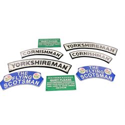 Collection of cast iron signs, including The Flying Scotsman, Yorkshireman, Cornishman etc 