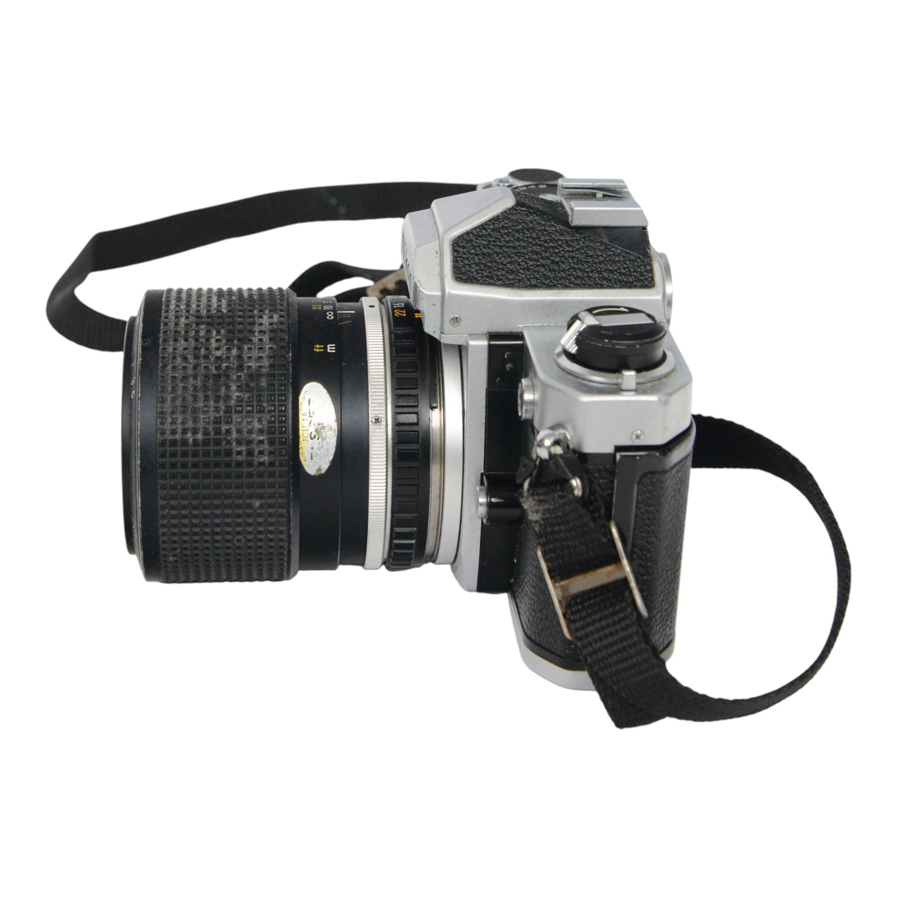 Two Nikon FM camera bodies, comprising Nikon FM serial no. 3239117, with a Nikon Series E 36-72mm 1:3.5 zoom lens and a Nikon FM2 serial no. 7141741, with a Nikkor 50mm 1:1.8 lens and a Nikon Series E 70-210mm 1:4 zoom lens