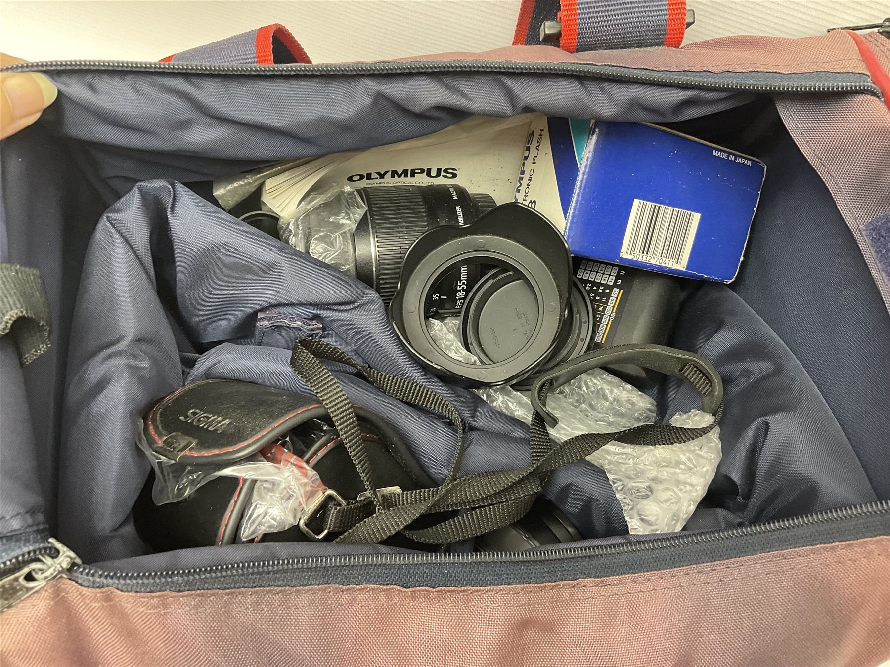 Cameras and accessories, to include Olympus OM101 Power Focus camera body, serial no 1076067, with 'Sigma AF Zoom 1:38, f=75 200mm' lens, serial no 2053714, Canon EOS 5000 camera body, serial no 1507812, with 'Canon Zoom EF 80-200mm, 1:4.5-5.6' lens, other cameras, by Miranda, Coronet and Ricoh and a collection of lenses, carry cases, etc 