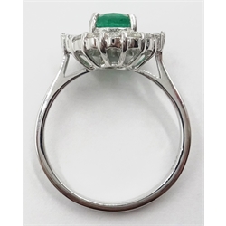  18ct white gold emerald and diamond cluster ring, stamped 750, emerald approx 1.2 carat, diamonds approx 0.5 carat    