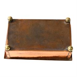  Arts & Crafts copper and enamel box, of rectangular form, the hinged lid with central enamel cabochon overlaid with pierced copper butterfly motif, raised on brass bun feet, H7cm, L17cm