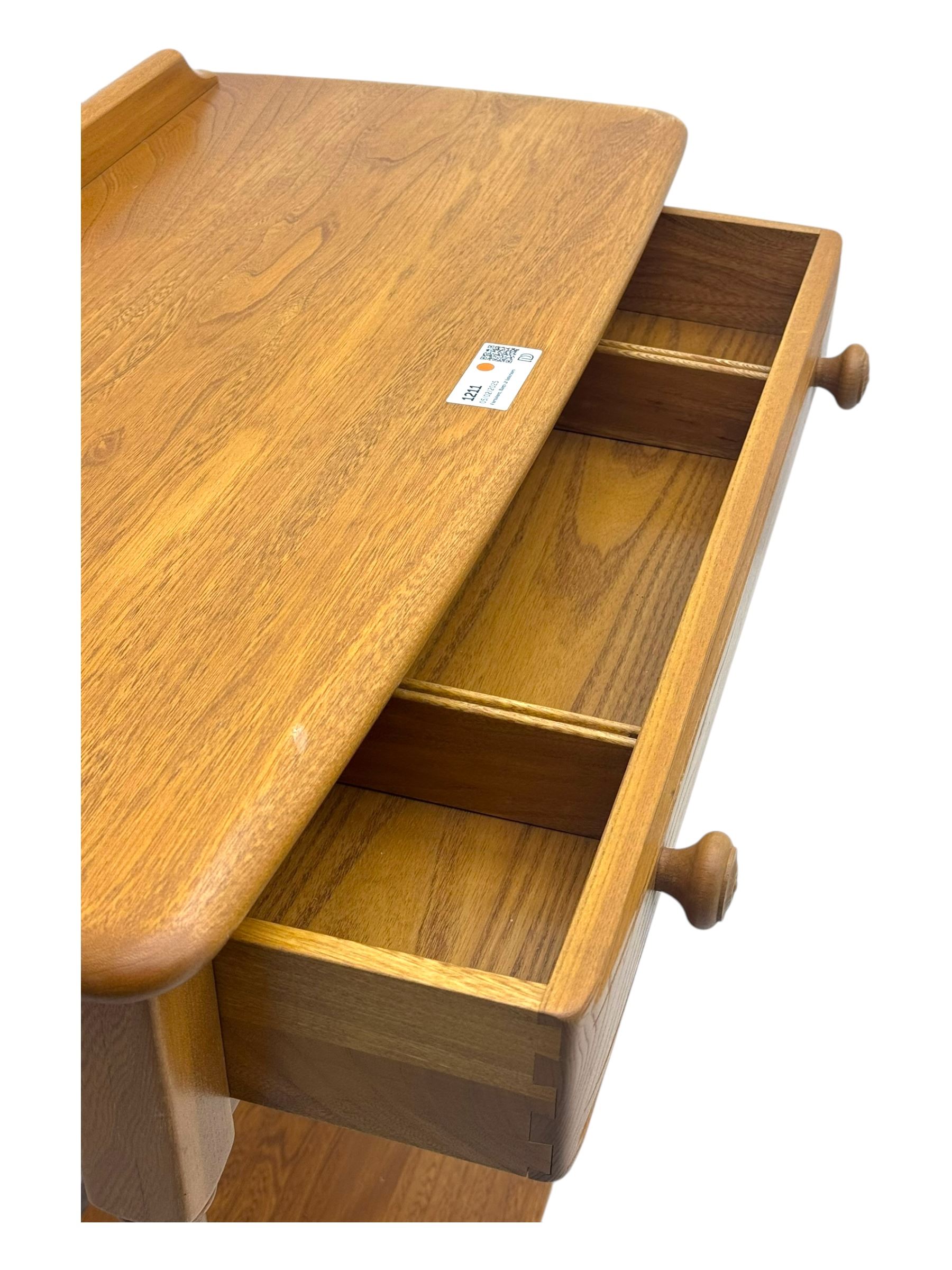 Lucian Ercolani for Ercol - mid 20th century light elm console table, rectangular top with raised gallery back over full-width frieze drawers, raised on tapered supports united by undertier 