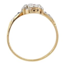 Art Nouveau gold and platinum milgrain set old cut diamond crossover twist ring, circa 1910-1920