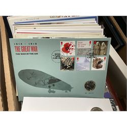 Approximately one hundred and fifteen Royal Mint coin covers, in two ring binder folders and loose, together with approximately 53 grams of Great British pre-1920 and approximately 68 grams of Great British pre-1947 silver threepence coins, and a small quantity of further pre-decimal coins